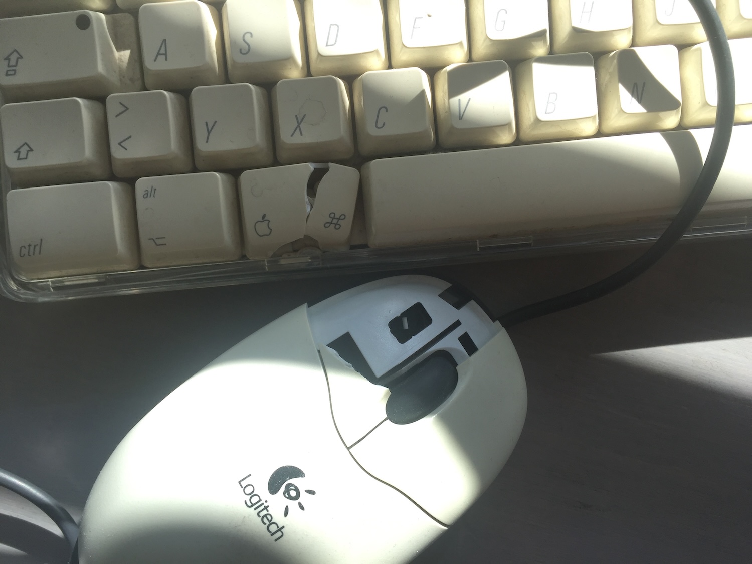 broken computer keyboard and mouse